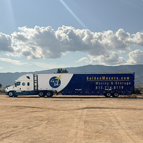 Commercial Moving Company For Corporate Relocations Tampa FL Image of Tampa-based Commercial Moving Company Truck with Mountain in the Background