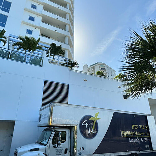 Commercial Moving Company Tampa Bay FL Truck of a Moving Company In Front of a Commercial Building in Tampa Florida