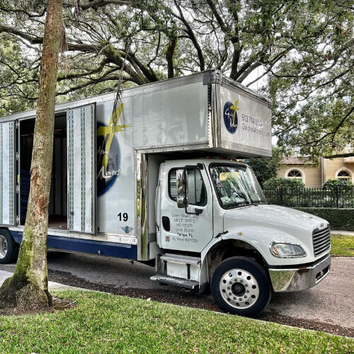 Doors of Moving Company Truck Opened To Load Furniture of Riverview Family