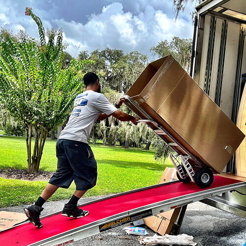 Stonelake Ranch Mover Loading a Heavy Box into Moving Company Truck