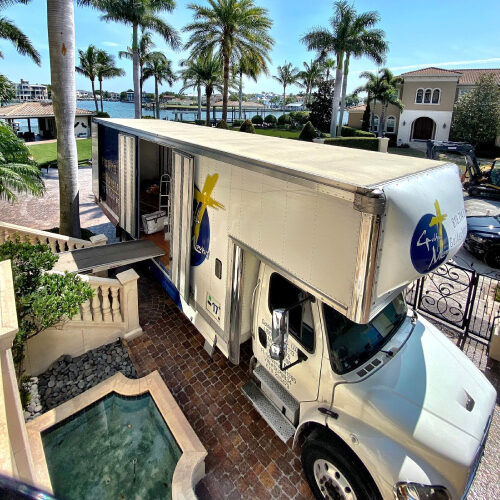 Apollo Beach Moving Company Truck Unloading Items in a Resort in Florida