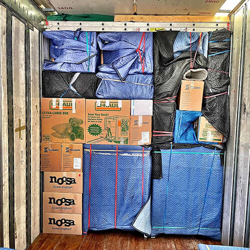 Things of a Lakeshore Ranch Couple Carefully Loaded Inside Moving Company Truck