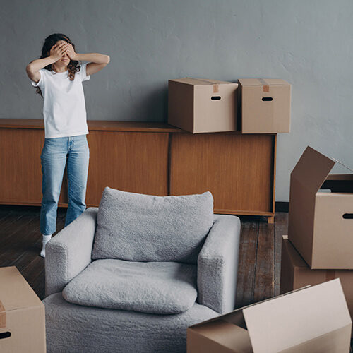 Lady Stressed Over Packing Thinking If Hiring Moving Company is a Better Idea