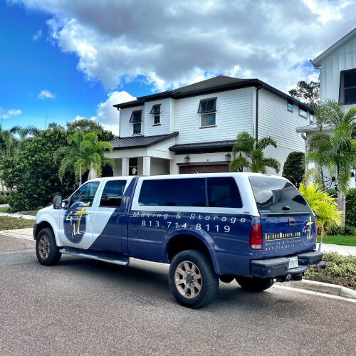 Moving Company Vehicle Parked In Front of a Residential Property in Davis Islands Florida