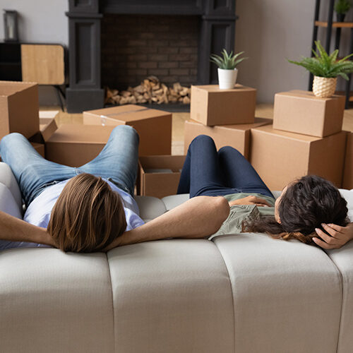 Moving Company in Florida Couple Waiting For Moving Company Who Will Transport Their Items to Florida
