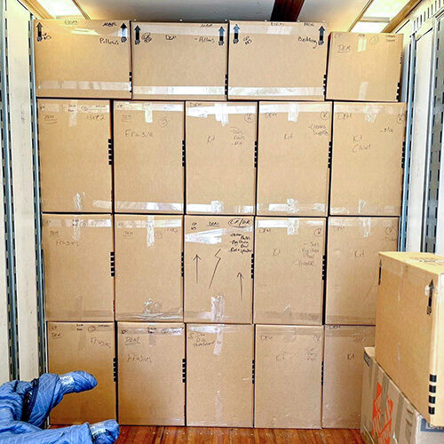 Residential Long Distance Moving Company in Tampa FL Four Layers of Boxes Containing Items of Tampa Family Who Hired Residential Long Distance Moving Company