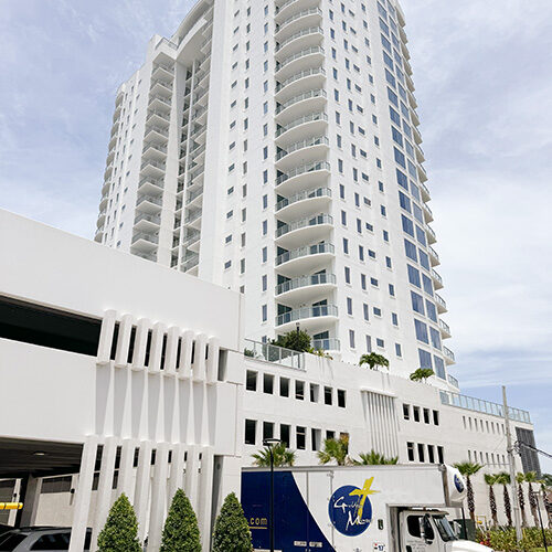 Residential Luxury Moving Company Tampa Bay FL Truck of Tampa-based Moving Company In Front of a Luxurious Residential Building