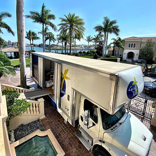 Residential Luxury Moving Company Tampa Bay Florida Luxury Moving Company Transporting Valued Items To a Beautiful Residential Area in Tampa FL
