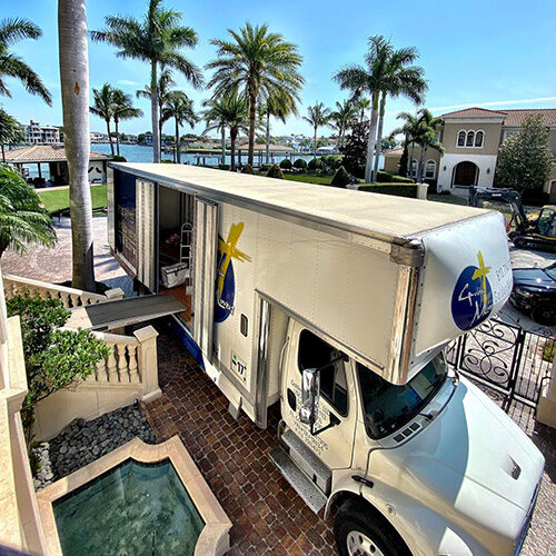 Residential Luxury Moving Company Tampa Florida Truck of Luxury Moving Company Parked at a Fancy Residential Subdivision in Tampa FL