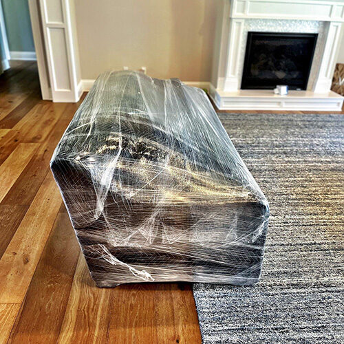 Residential Luxury Moving Company in Tampa Florida Sofa Wrapped Professionally by Tampa-based Residential Luxury Moving Company